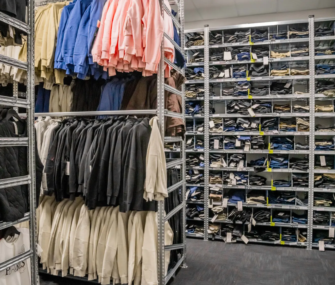 Retail garment and apparel storage system with shelving and hanging solutions for organised stockroom management